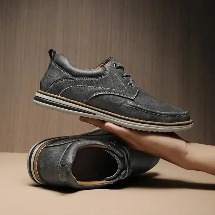 Luciano Genuine Leather Oxfords in dark gray showcasing lace-up design and contrast stitching, ideal for daily wear.