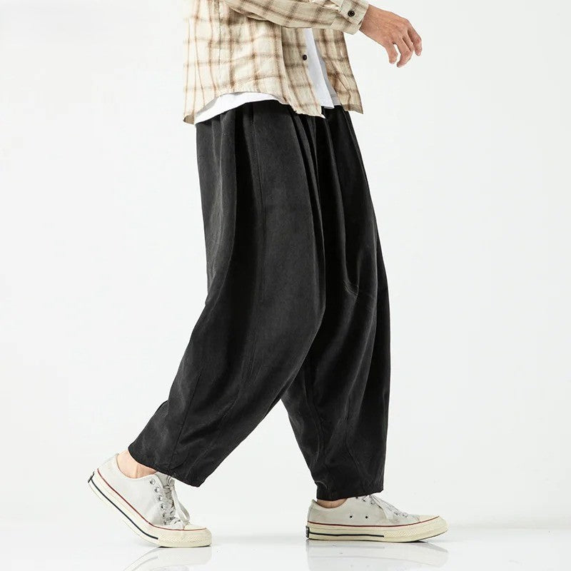 Cove Park relaxed pants in black, featuring a wide-leg silhouette, elastic waistband, and soft, breathable fabric.