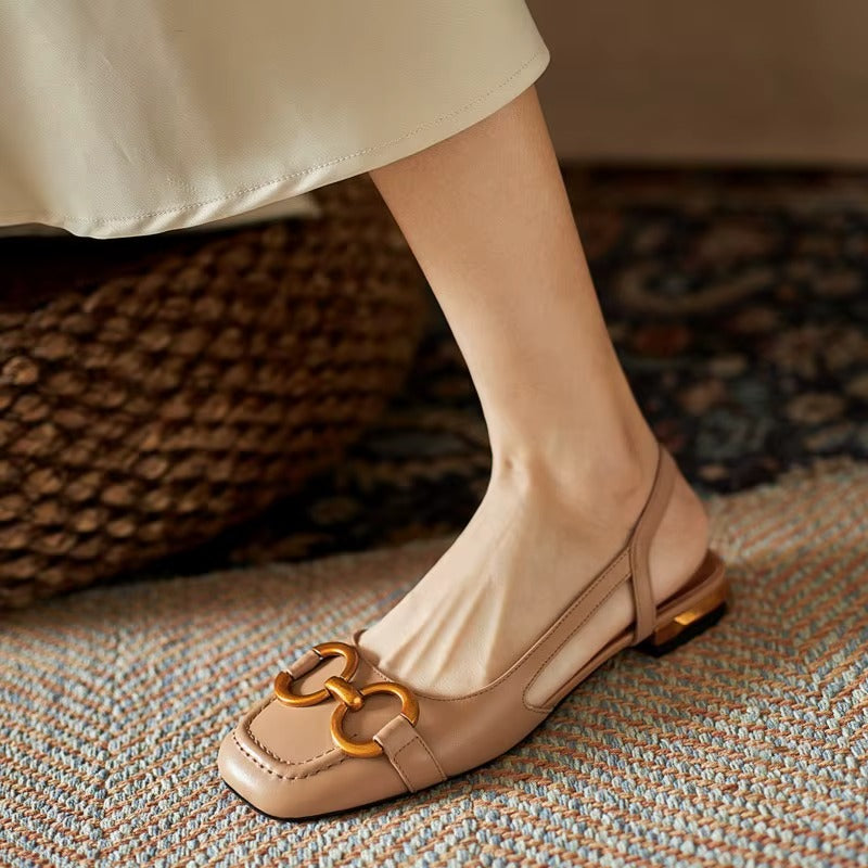 Rivena Slingback Sandals with structured square toe and metallic detailing, showcasing comfort and modern style.