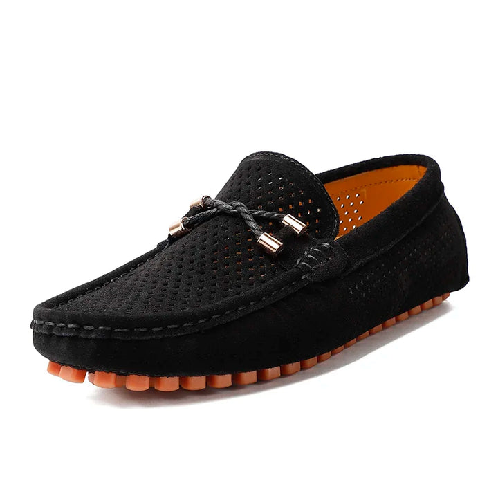 Marco Corsa Men's Suede Loafers, black perforated design, flexible driving sole, stylish metal-tipped laces, and soft interior.