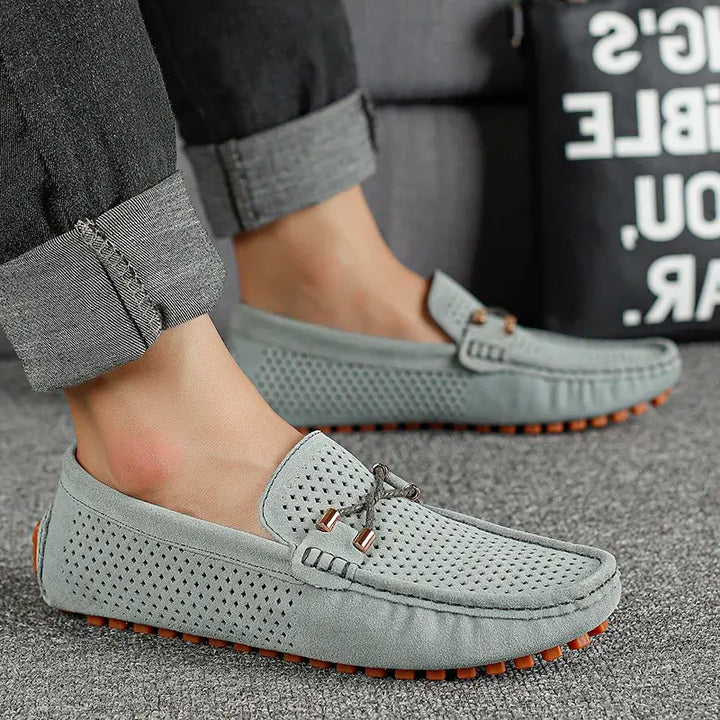 Marco Corsa men's grey suede loafers with perforated upper and flexible sole for comfort and style.