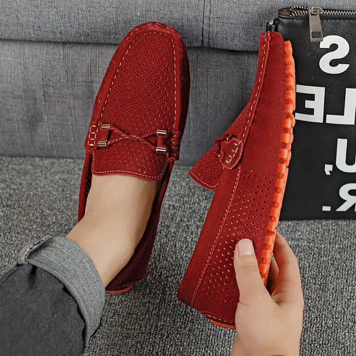 Marco Corsa Men's Suede Loafers in red with perforated upper, showcasing flexibility and comfort for warm days.