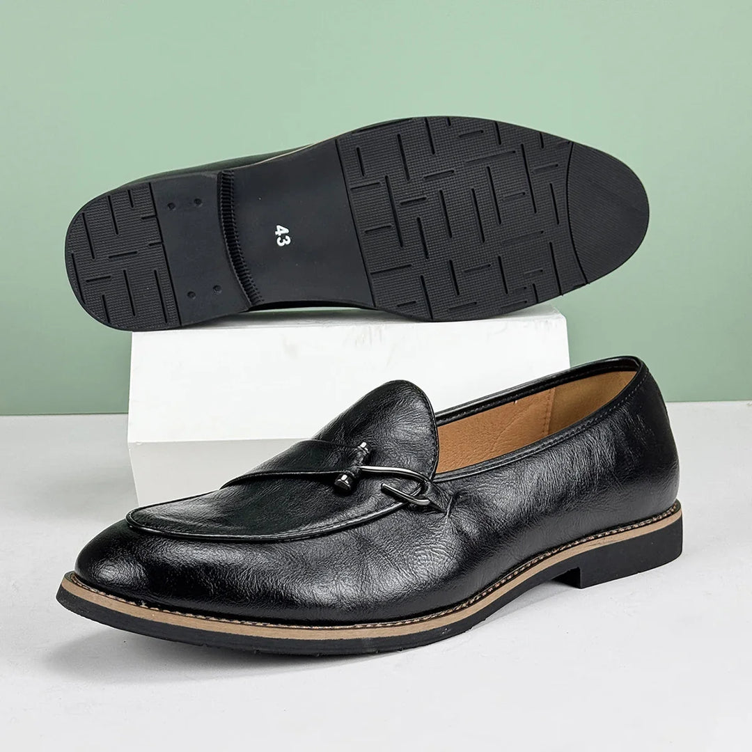 Renley Men's Genuine Leather Loafers with burnished toe and rubber sole, featuring cushioned insole and metal bit accent.