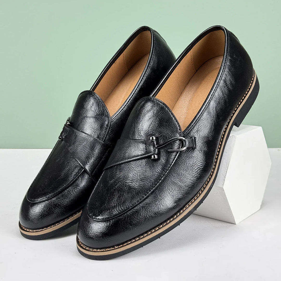 Renley Men's Genuine Leather Loafers in black with burnished toe and metal bit detail, featuring cushioned insole and rubber sole.