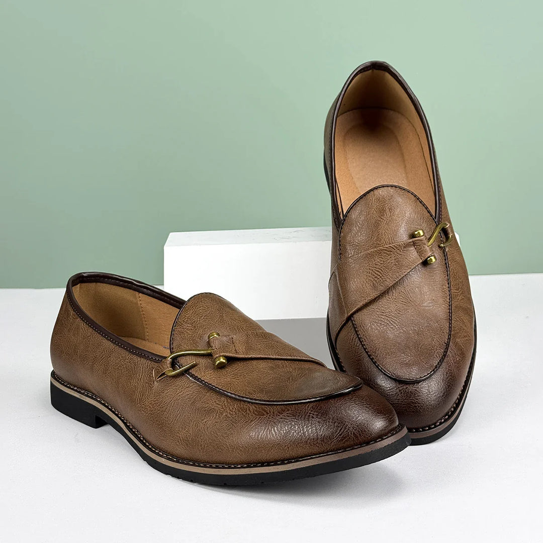 Renley Men's Genuine Leather Loafers with burnished toe and metal bit detail, offering comfort and style in a slip-on design.