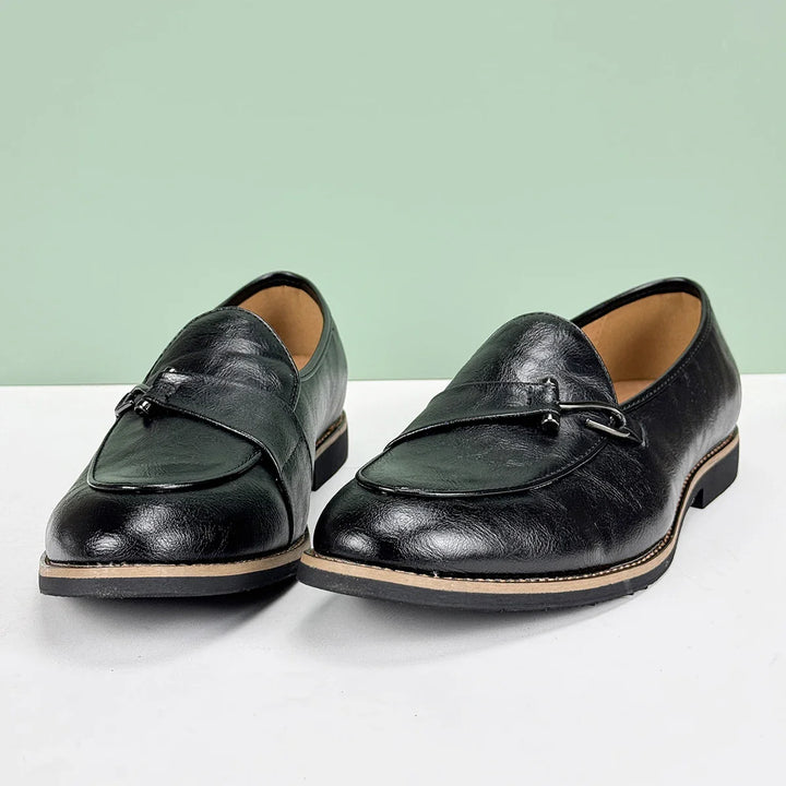 Renley Men's Genuine Leather Loafers in black with burnished toe and metal bit accent for comfort and style.