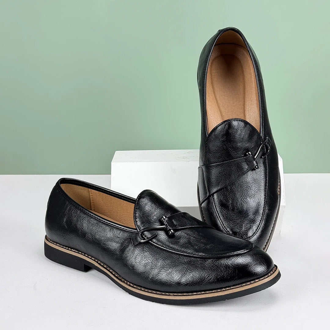 Renley Men's Genuine Leather Loafers in black with burnished toe and metal bit detail, perfect for everyday style and comfort.
