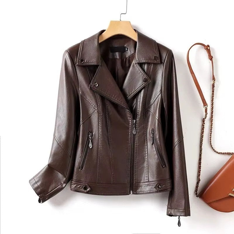 Brown leather jacket on a hanger with a brown handbag on a white background