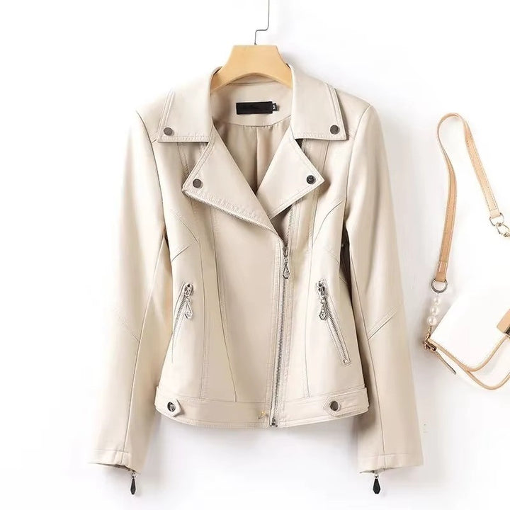Beige leather jacket on a hanger with a white background