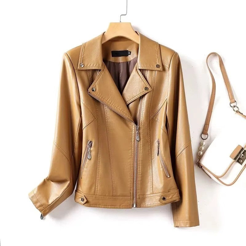 Tan leather jacket on a hanger with a matching handbag on a white background